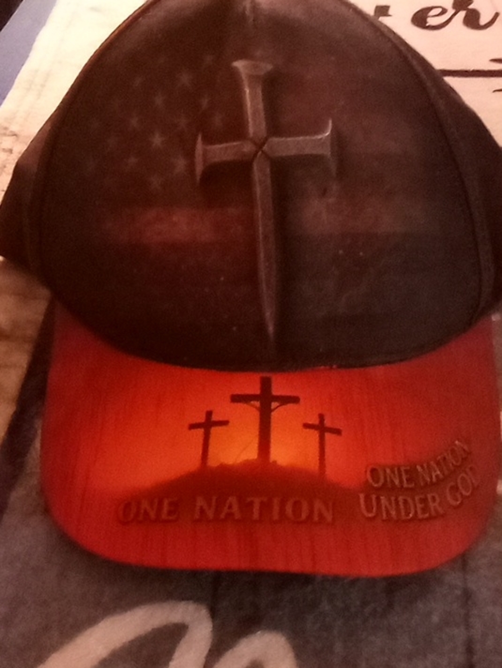 Faith Cross Trucker Hat in Black and Orange